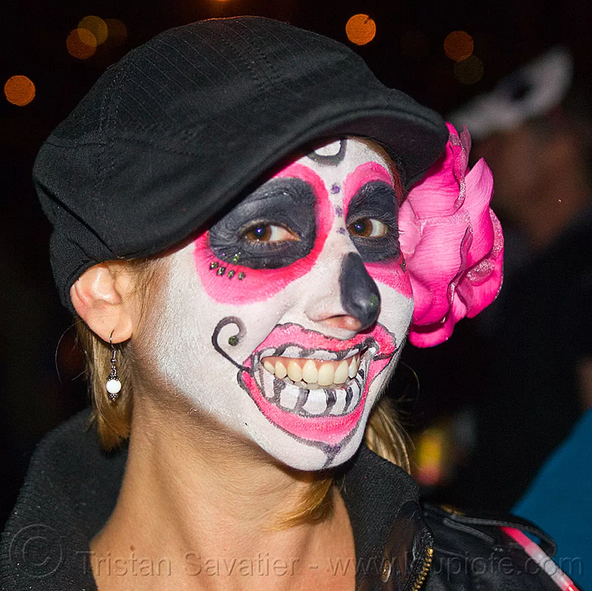 sugar skull makeup with pink flower