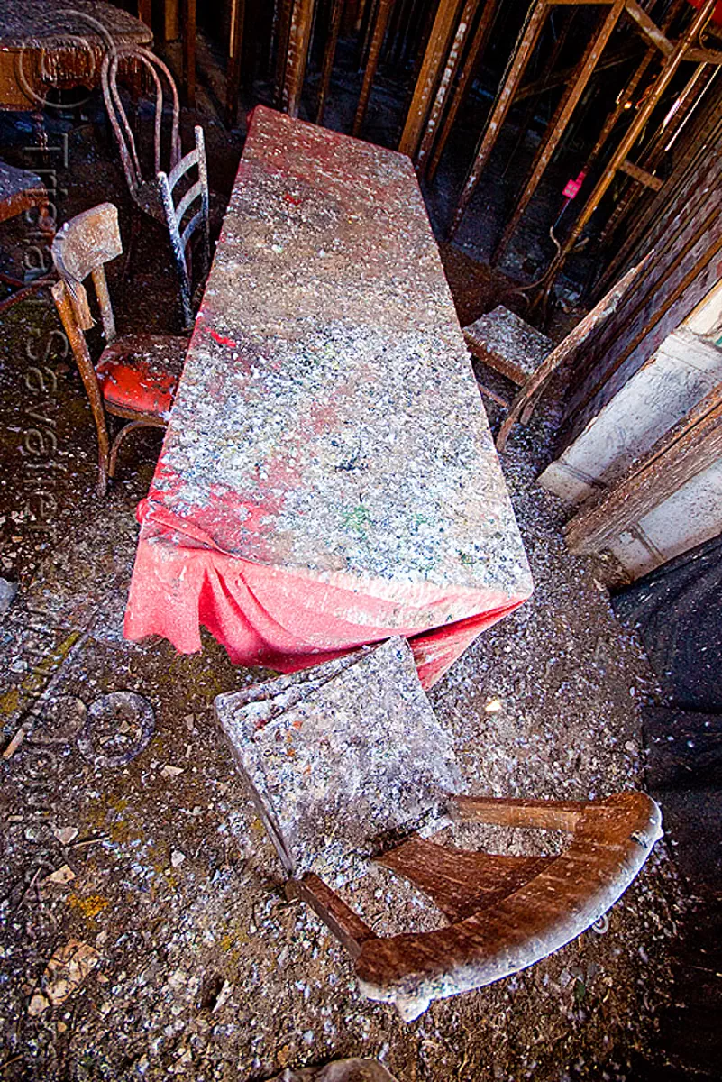 table and chairs in abandoned building, chairs, defenestration building, pigeon droppings, red, table