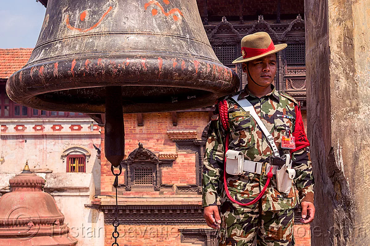 taleju bell and nepali gurkha army soldier, bhaktapur durbar square, nepal