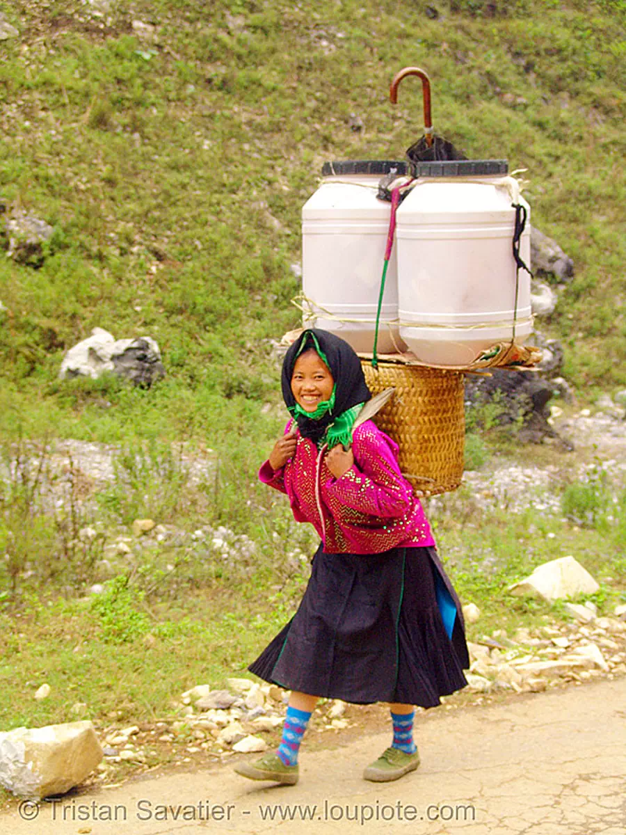tribe girl with backpack, vietnam