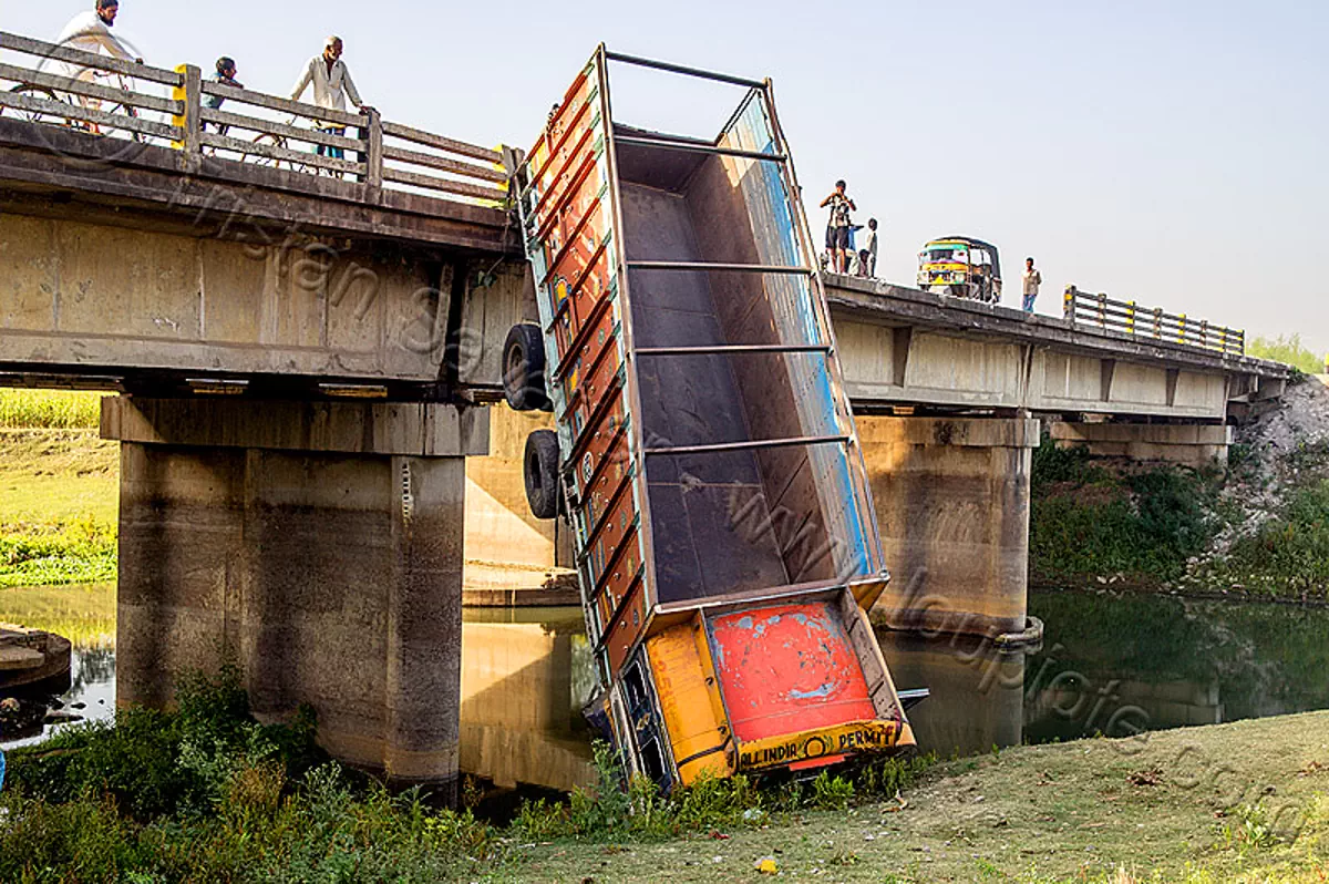 truck hanging off bridge - traffic accident (india), bridge, crash, crushed, hanging, lorry, overpass, river, road, tata motors, traffic accident, truck accident, west bengal, wreck