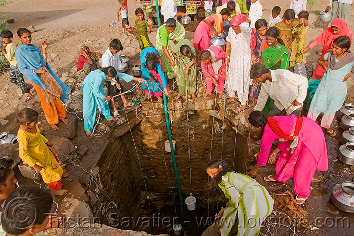 villagers around water well - ajanta (india), ajanta, buckets, communal water well, india, ropes, water jars, women