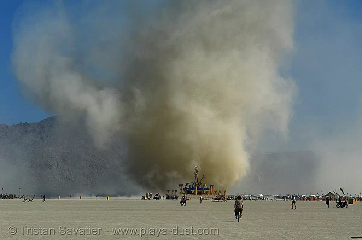 wednesday's giant dust devil behind the man - burning-man 2006, burning man, dust devil, dust storm, playa dust, the man, twister