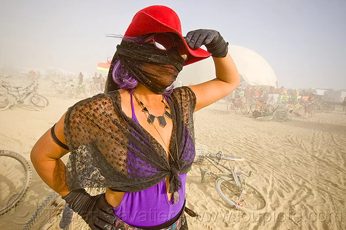 woman with red hat in white out (dust storm) - burning man 2013, black gloves, black lace, burning man, dust storm, mask, necklace, purple, red hat, sunglasses, white out, woman