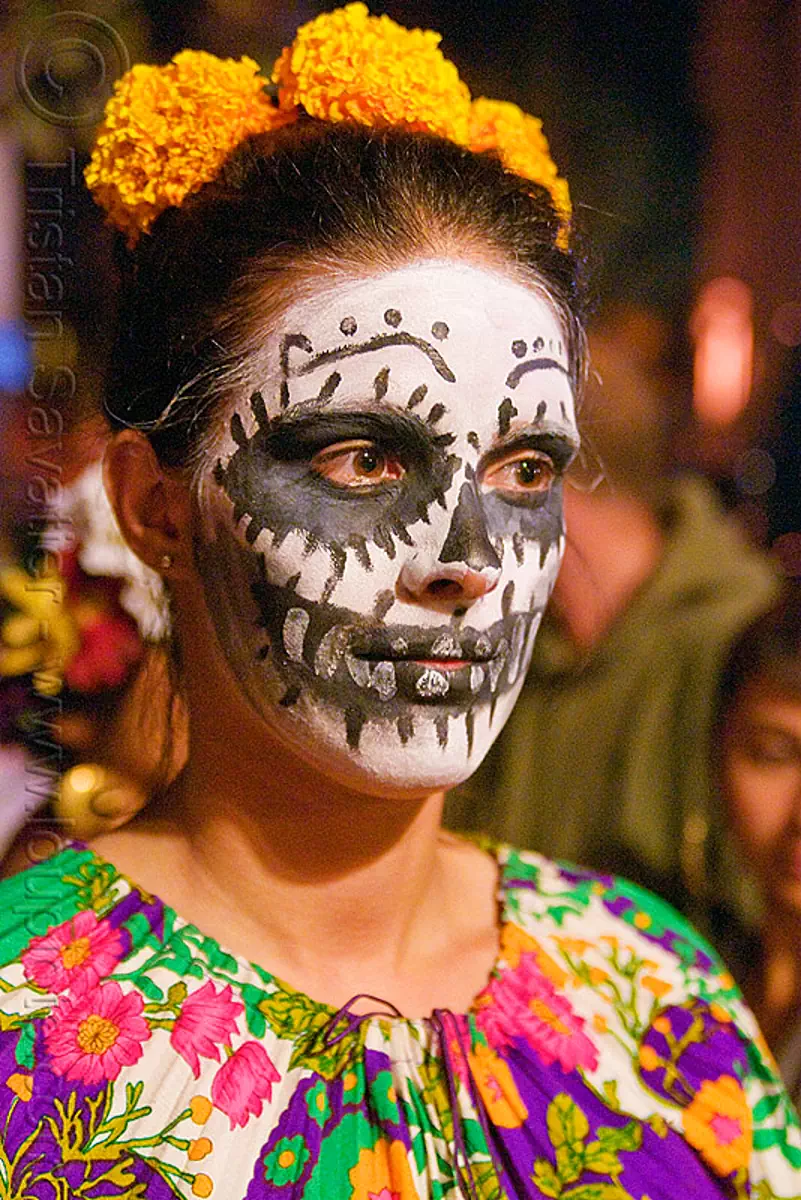 woman with skull makeup - Día de los muertos - halloween (san francisco), day of the dead, dia de los muertos, face painting, facepaint, halloween, night, sugar skull makeup, woman, yellow flowers