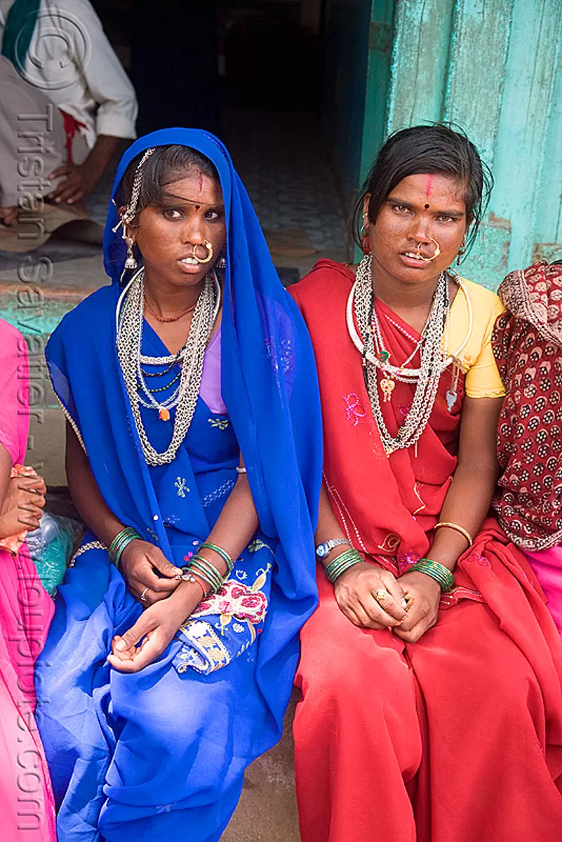 women with chainmail necklaces (india), blue, chainmail, india, jewellery, necklaces, nose piercing, nose ring, nostril piercing, red, sailana, saree, sari, sitting, women