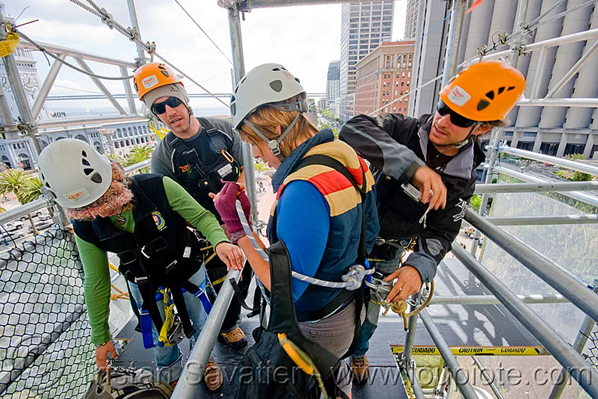 zip-line over san francisco, adventure, cable line, cables, climbing helmet, embarcadero, hanging, jessika, mountaineering, steel cable, tower, trolley, tyrolienne, urban, woman, zip line, zip wire