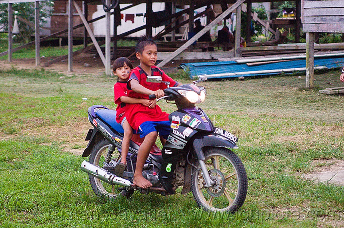 Young Kids Riding Motorbike