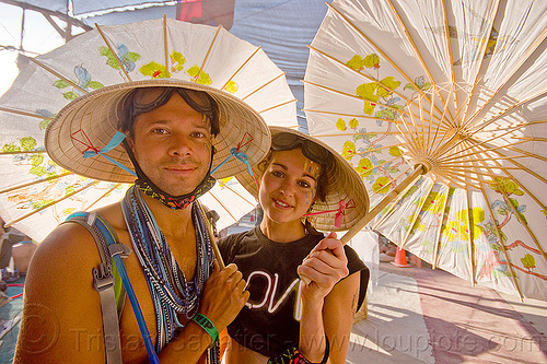 2013 - burning man, conical hats, hat, japanese umbrellas, man, straw hats, woman