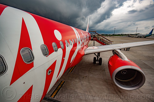 air-asia airbus a320 on the ground, a320, air asia, airbus, cloudy sky, jakarta international airport, livery, passenger plane, tarmac