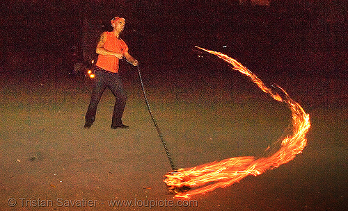 alex spinning a fire ball (san francisco), fire ball, fire dancer, fire dancing, fire performer, fire spinning, night, shanti alex, spinning fire