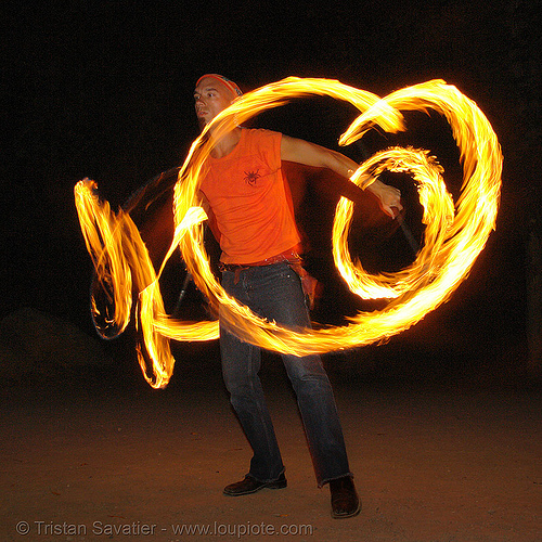 alex spinning fire staffs (san francisco), fire dancer, fire dancing, fire performer, fire spinning, fire staff, night, shanti alex, spinning fire