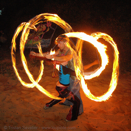 alex spinning poi with a girl (san francisco), fire dancer, fire dancing, fire performer, fire poi, fire spinning, night, shanti alex, spinning fire