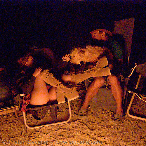 alice and chad (and dog), boots, campfire, camping, chad, dog, hat, night