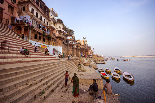 along the ghats of varanasi (india), buildings, ganga, ganges river, ghats, houses, moored, mooring, river bank, river boats, steps, varanasi