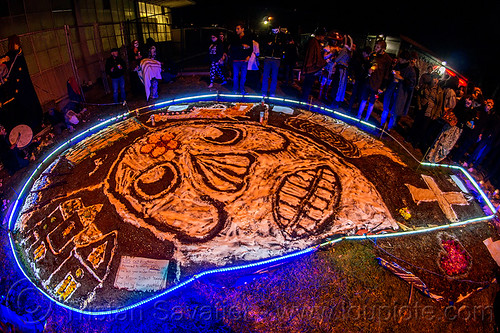 altar de muerto with large skull and house drawn with salt on the ground - dia de los muertos (san francisco), altar de muertos, candles, day of the dead, dia de los muertos, drawing, halloween, memorial, night, skull