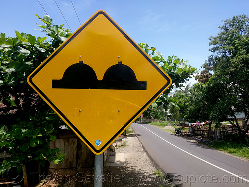 altered speed bumps road sign, road sign, speed bumps, speed humps