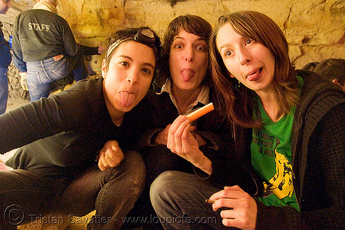 alyssa, gaëlle and coraline - catacombes de paris - catacombs of paris (off-limit area), candles, cataphile, cave, clandestines, girls, illegal, new year's eve, sticking out tongue, sticking tongue out, underground quarry, women