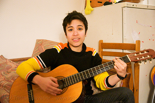 alyssa singing and playing the guitar in paris, guitar player, singing, woman