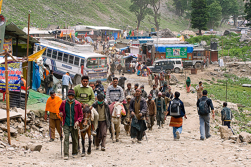 amarnath yatra (pilgrimage) - kashmir, amarnath yatra, bus, crowd, hindu pilgrimage, horseback riding, horses, kashmir, kashmiris, mountain trail, mountains, pilgrims, ponies, road