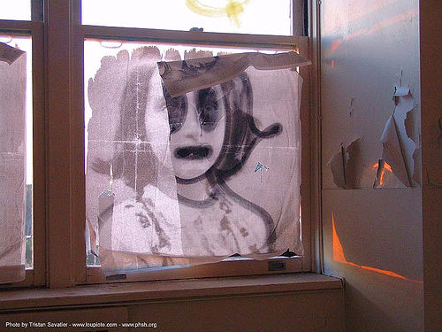 anne frank poster in window, abandoned building, abandoned hospital, ann frank, anne frank, desecrated, desecration, graffiti, presidio hospital, presidio landmark apartments, salt, trespassing, vandalized, window