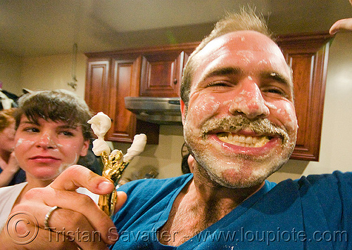 apple pie eating contest champion with trophy, apple pie, champion, competition, contest, contestant, dirty, eating, food, man, mustache, proud, smudged, trophy, whipped cream, winner, woman