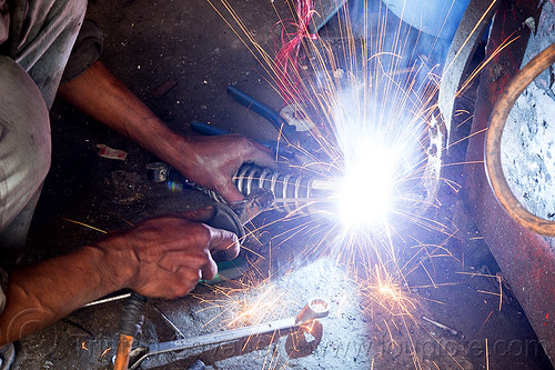 arc welding repair on motorbike shock (india), 350cc, arc welding, fixing, man, mechanic, motorcycle, repairing, royal enfield bullet, shock absorber, sikkim, thunderbird, welder, worker, working