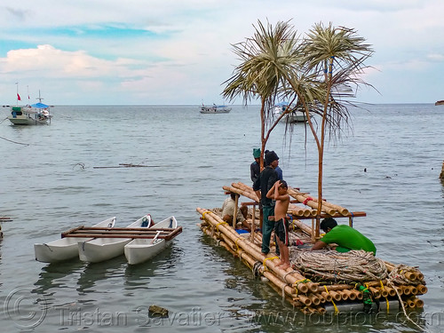 bamboo floating island with fake trees to attract fish, bamboo raft, fisherman, fishermen, fishing, floating island, men, ocean, sea