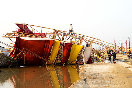 bamboo structure toppled by the wind storm - kumbh mela 2013 (india), ashram, bamboo structure, broken, collapsed, destruction, flood, flooded, gate, hindu pilgrimage, hinduism, kumbh mela