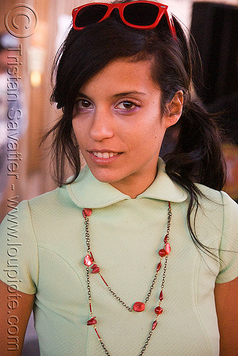 beautiful girl - burning man decompression, adi, green shirt, necklace, sunglasses, woman