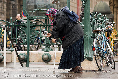 beggar - woman (paris), beggar, begging, crutch, head cover, metro entrance, metro station, pauverty, poor, subway entrance, veil, woman