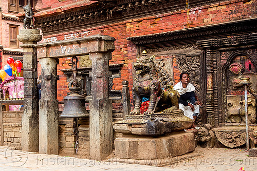 bhairavnath temple bell - tachupal tole - bhaktapur (nepal), bell, bhairavnath temple, bhaktapur, brass, hindu temple, hinduism, sculpture, sitting, tachupal tole, woman