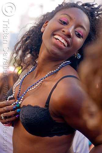 black girl dancing, beads, black bra, black woman, gay pride festival, necklaces, underwear uu