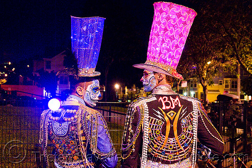 blue and pink matador costumes, black rock city, blue hat, blue-print, burning man logo, carnival hat, costume, day of the dead, dia de los muertos, face painting, facepaint, halloween, hats, large hat, men, night, pink hat, rebar, sugar skull makeup, suliman nawid