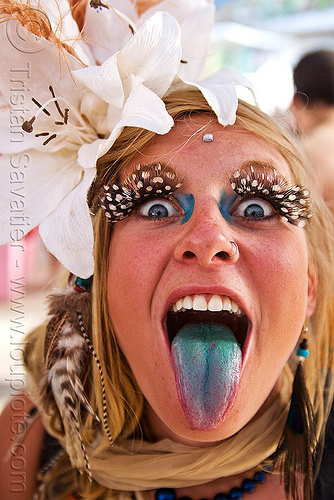 blue tongue - sticking tongue out, blue tongue, feather eyelashes extensions, hat, headdress, jenni, sticking out tongue, sticking tongue out, white flowers, woman