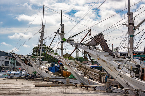 bows of traditional pinisi boats (bugis schooners) at the makassar harbor, boats, bugis schooners, dock, harbor, makassar, pinisi, ship bow, ships