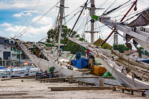 bows of traditional pinisi boats (bugis schooners) docked at the makassar harbor, boats, bugis schooners, dock, harbor, makassar, pinisi, ship bow, ships