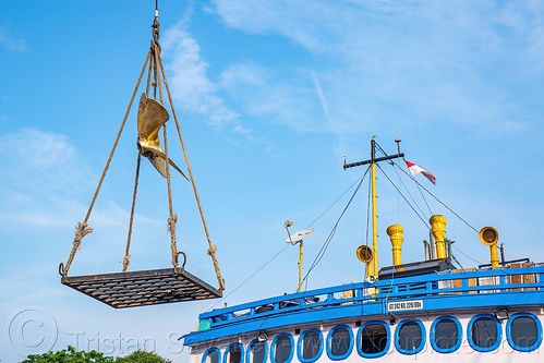 brass boat propeller loaded on cargo ship, boat, cargo ship, dock, harbor, merchant ship, surabaya