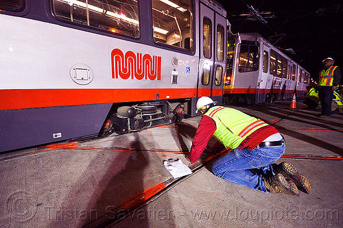 breda lrv test train, ansaldo breda, breda lrv, high-visibility jacket, high-visibility vest, light rail, man, muni, ntk, railroad construction, railroad tracks, railway tracks, reflective jacket, reflective vest, safety helmet, safety vest, san francisco municipal railway, test train, track maintenance, track work, tram, worker