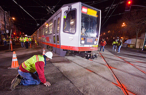 breda lrv test train, ansaldo breda, breda lrv, high-visibility jacket, high-visibility vest, light rail, man, muni, ntk, railroad construction, railroad tracks, railway tracks, reflective jacket, reflective vest, safety helmet, safety vest, san francisco municipal railway, test train, track maintenance, track work, tram, worker