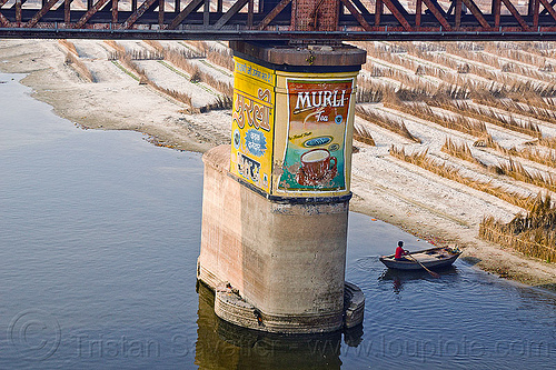 bridge pillar in ganga river - murli tea painted ad (india), advertising, agriculture, bridge pillar, floodplain, ganga, ganges river, metal bridge, murli tea, painted ad, river boat, riverbed, rowing boat, sand, small boat, truss bridge