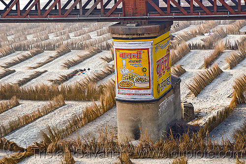 bridge pillar in ganges floodplain, advertising, agriculture, bridge pillar, floodplain, ganga, ganges river, high protein, mantora oil products, metal bridge, painted ad, riverbed, sand, soya bari, truss bridge