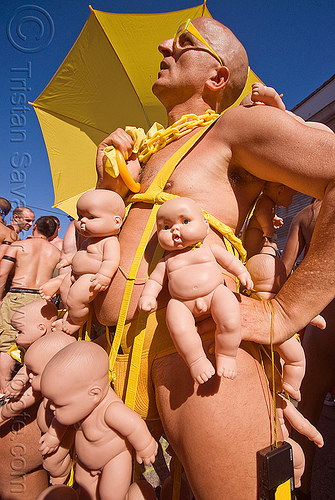 bruce beaudette with his babies, babies, baby dolls, bruce beaudette, costume, man, yellow