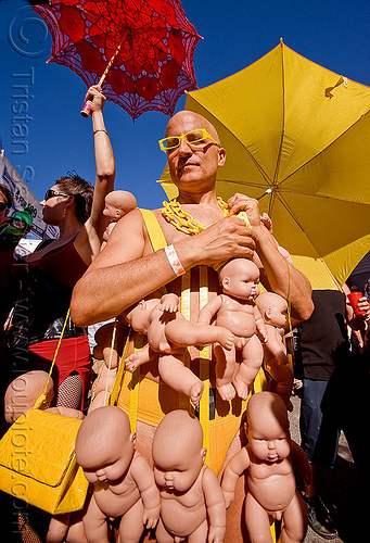 bruce beaudette with his baby dolls costume, babies, baby dolls, bruce beaudette, costume, man, umbrellas, yellow