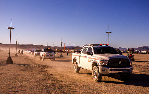 burning man - a procession of law enforcement cars converge to the temple for memorial to fallen officer, blm, cars, cops, law enforcement officers, leo, memorial, park rangers, police, sheriff, suv