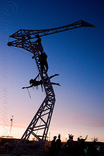 burning man - aerialists on "the heron", aerialists, arielle, art installation, backlight, christina sporrong, crane, dancing lady, steel, sunset, the heron project, truss