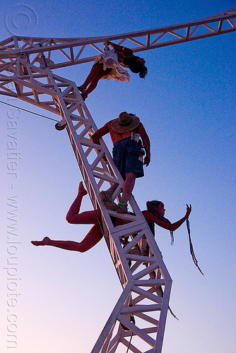 burning man - aerialists on "the heron", aerialists, arielle, backlight, christina sporrong, crane, dancing lady, steel, sunset, the heron project, truss