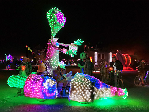 burning man - alien art car, alien, burning man art cars, burning man at night, glowing, mutant vehicles, unidentified art car