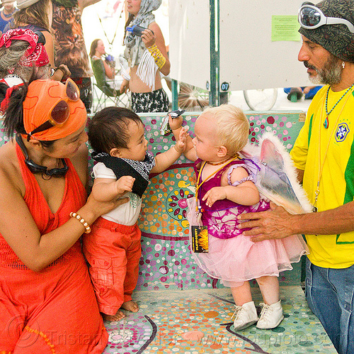 burning man - babies playing, babies, boy, chid, children, father, girl, kids, man, mother, toddlers, woman