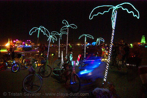 burning man - bicycles with el-wire palm-trees, burning man at night, el-wire, electroluminescent wire, glowing, palm trees
